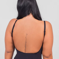 Isabella - String Bodysuit with Open Rug Design