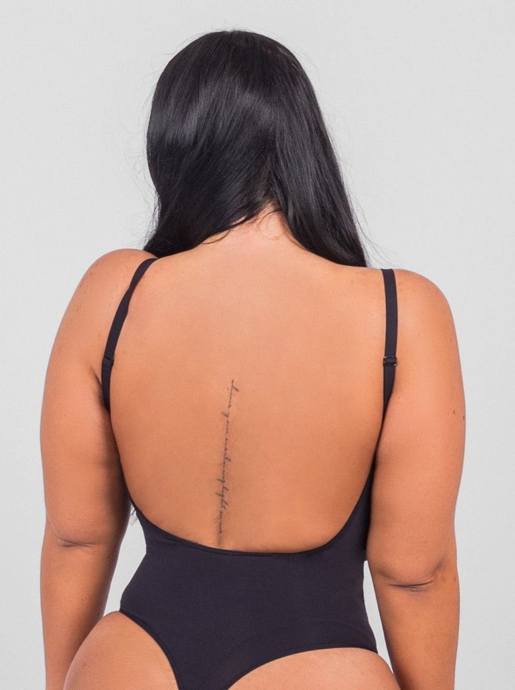 Isabella - String Bodysuit with Open Rug Design
