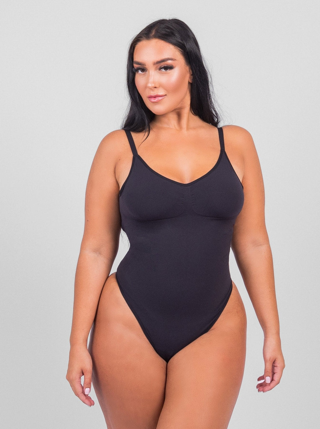 Isabella - String Bodysuit with Open Rug Design